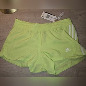 Bright green woman adidas shorts